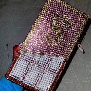 Pink money clutch